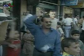 Imagem da TV portuguesa RTPi s 12h24 de 11/9/2001
