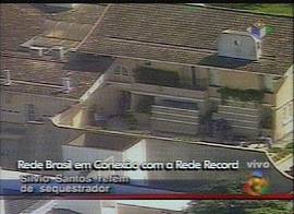 Captura de imagens de televis�o ao vivo da resid�ncia de S�lvio Santos, em 30/8/2001