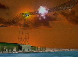 ...por um parafuso que detonou um cabo de alta tens�o. (captura de tela - Rede TV!, 22/1/2002, 21H32)